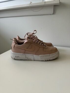 Nike Women's Blush Leather Low-Top Sneakers